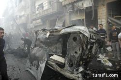 مقتل 21 شخصا على الأقل في تفجير سيارتين في حمص بسوريا