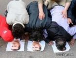 المخابرات السورية تجبر شبان سوريين للسجود لبشار الأسد‏